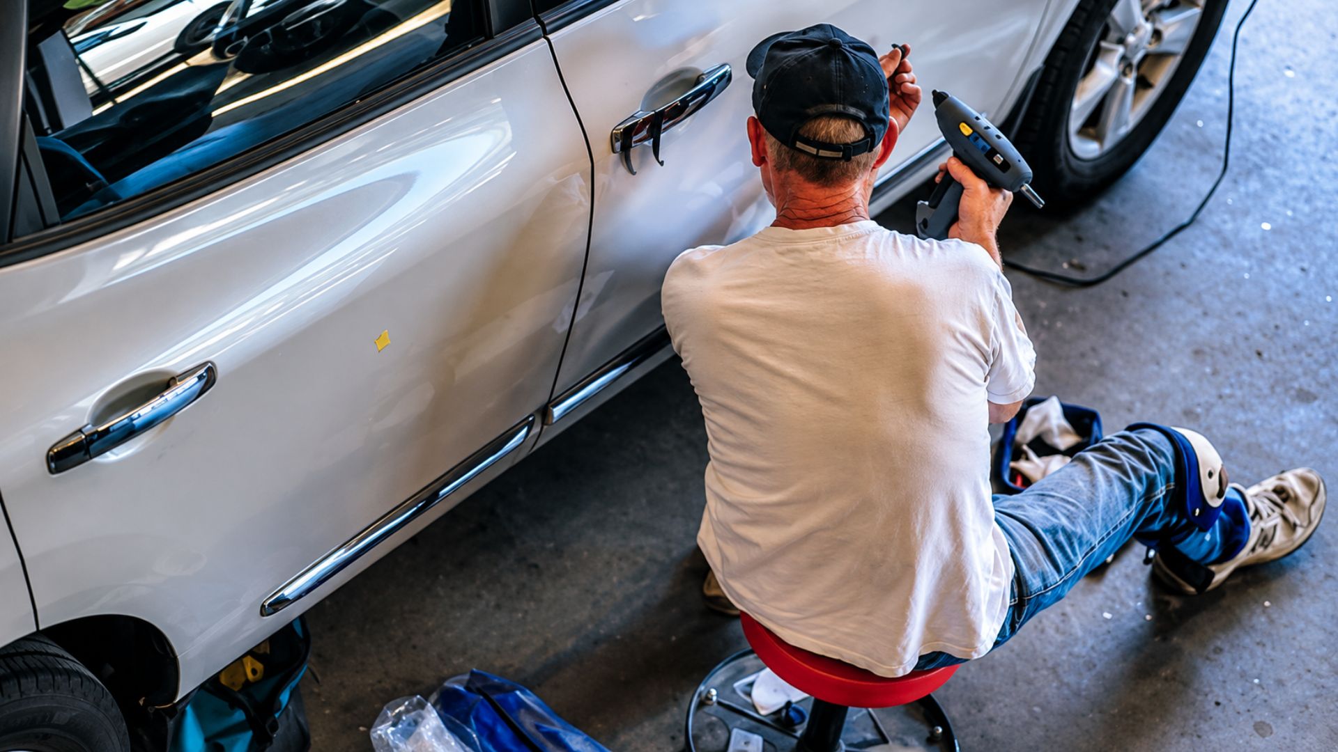 Mechanic working on vehicle